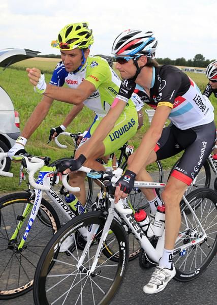 Ivan Basso (Liquigas-Cannondale) has a chat with Frank Schleck (RadioShack-Nissan).