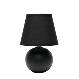 A black table lamp with a globe base and lampshade