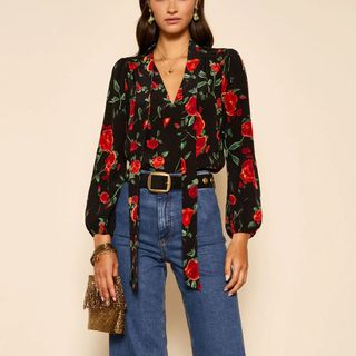 Rixo Moss floral print Blouse on model, worn with blue jeans 