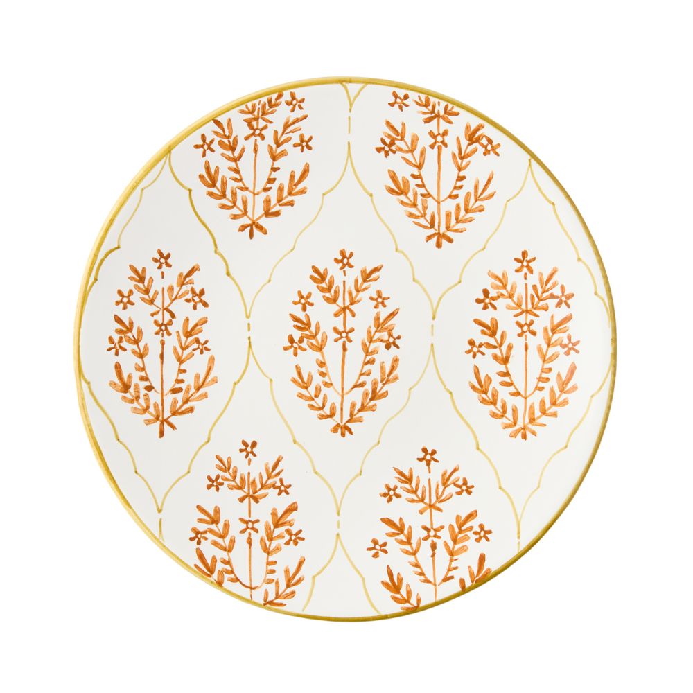 White salad plate with block print orange floral repeating pattern