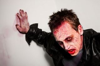 man dressed as zombie