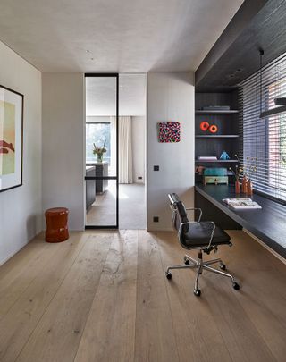 wide plank flooring with home office