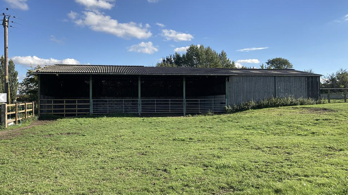 A barn in a field at Groudle Glen