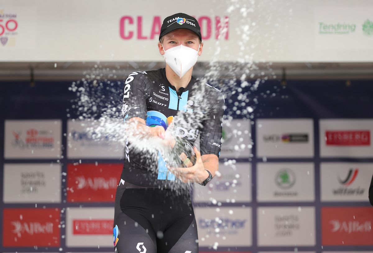 Picture by Alex Whitehead/SWpix.com - 08/10/2021 - Cycling - AJ Bell Women's Tour of Britain - Stage Five: Colchester to Clacton-on-Sea, England - Podium - DSM's Lorena Wiebes splashes the champagne after victory on stage 5 of the Women's Tour of Britain.