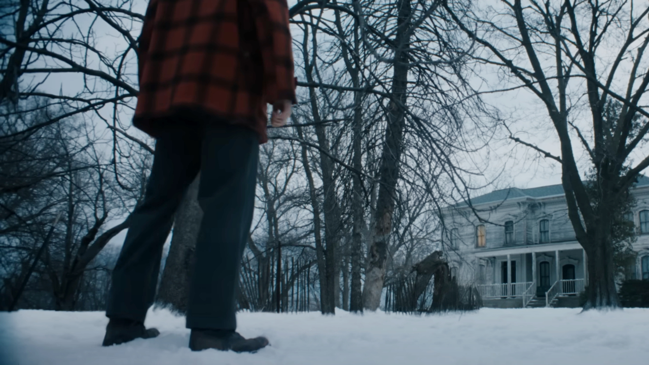 A person standing in the snow in Monster: The Ed Gein Story