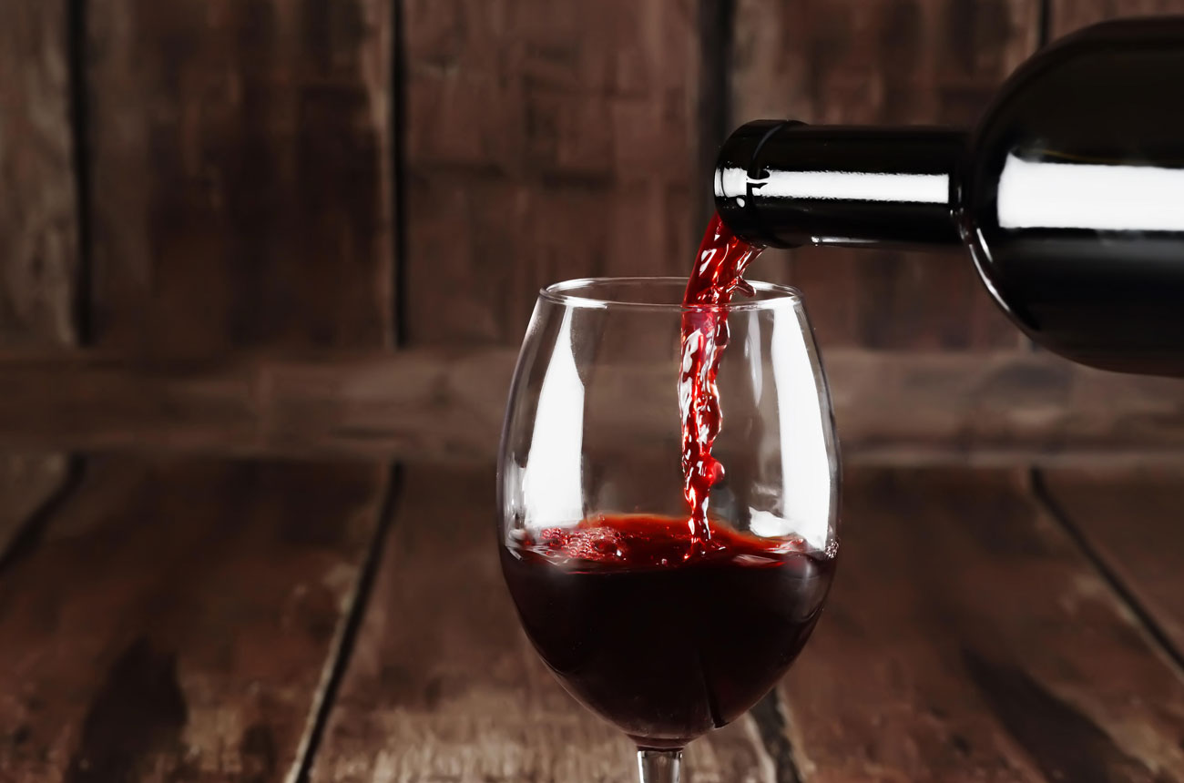 red wine poured into a glass