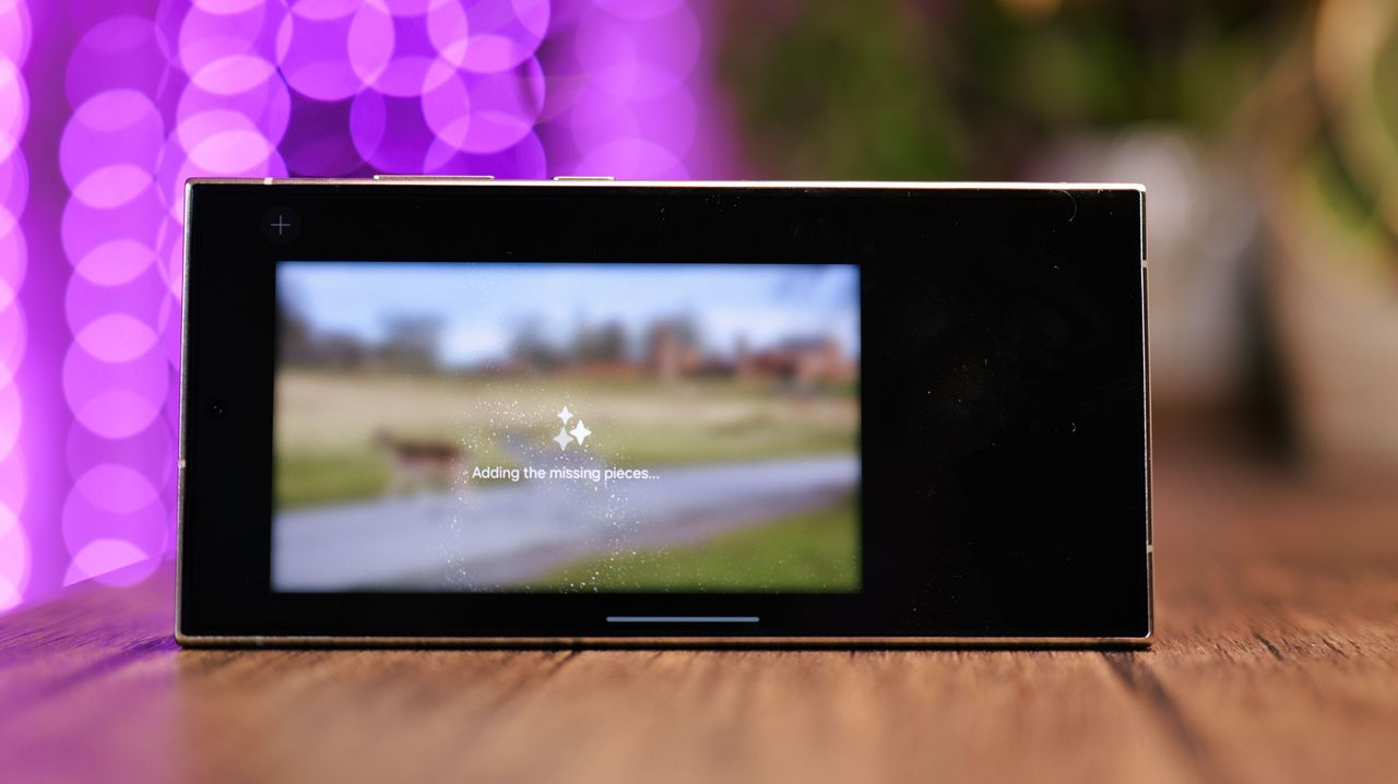 Photo displayed on a Samsung Galaxy S24 Ultra phone screen with purple lights blurred in the background