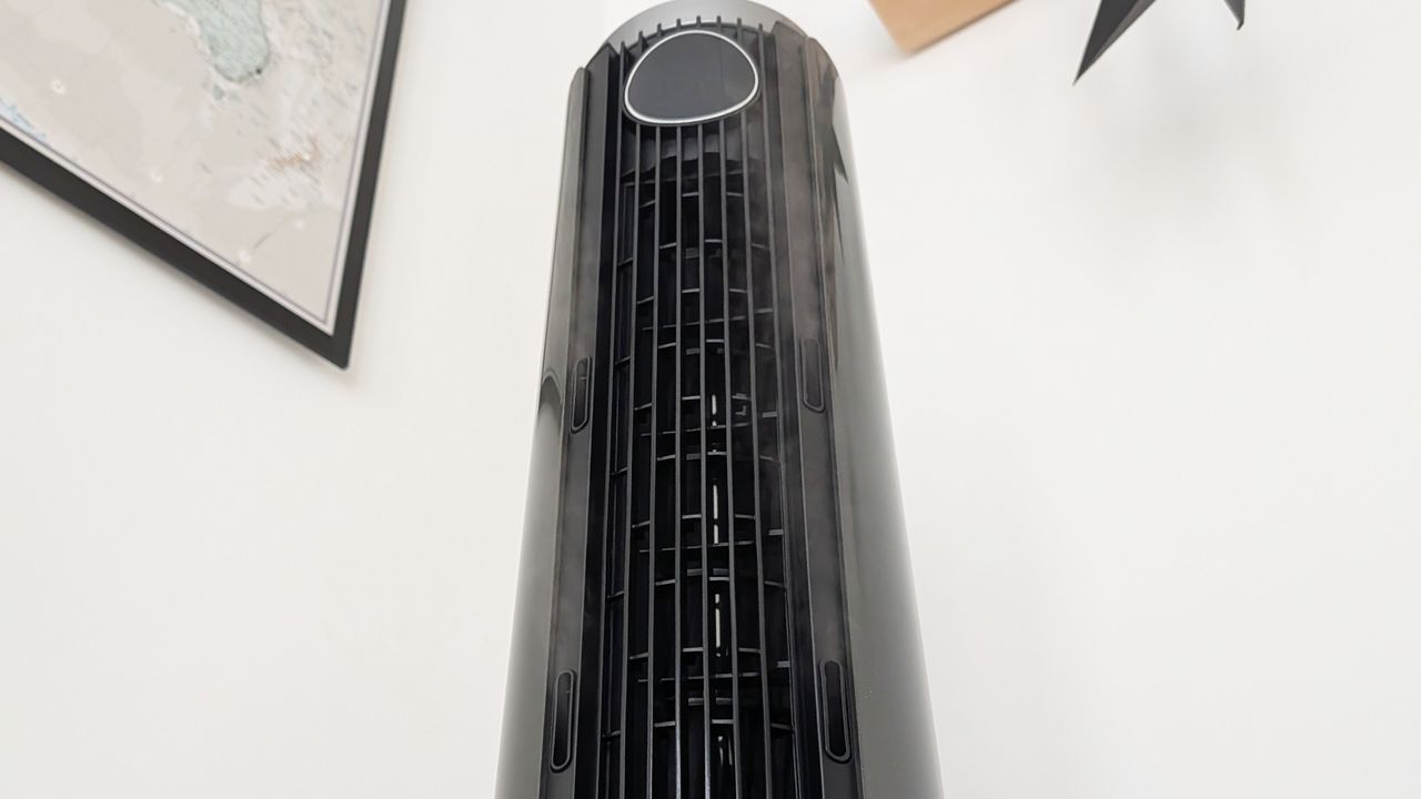 The front grille of the Dreo Smart Misting Fan 765S, with a tiny hint of mist just visible.