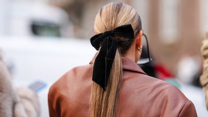 Woman wearing her blonde hair in a bow