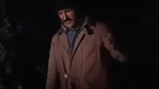 Gene Hackman with a cowboy hat and a mustache in Bite the Bullet