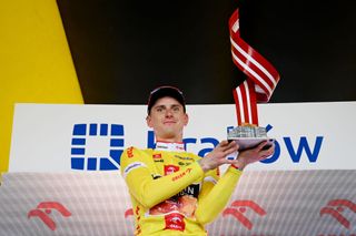 KRAKOW POLAND AUGUST 04 Matej Mohori of Slovenia and Team Bahrain Victorious celebrates at podium as Yellow leader jersey winner during the 80th Tour de Pologne 2023 Stage 7 a 1666km stage from Zabrze to Krakw UCIWT on August 04 2023 in Krakw Poland Photo by Dario BelingheriGetty Images