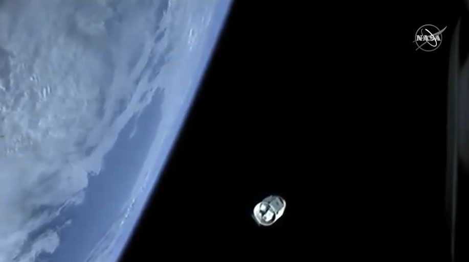 SpaceX's Dragon CRS-19 spacecraft pulls away from its Falcon 9 rocket second stage in this camera view from the booster.