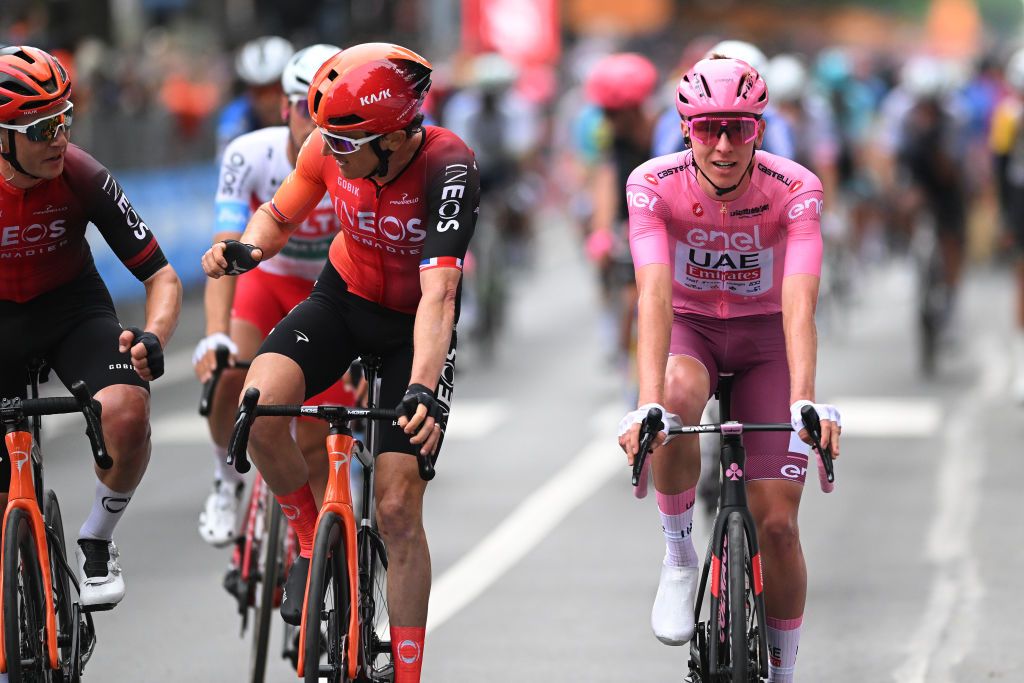 FOSSANO ITALY MAY 06 LR Magnus Sheffield of The United States Geraint Thomas of The United Kingdom and Team INEOS Grenadiers and Tadej Pogacar of Slovenia and UAE Team Emirates Pink Leader Jersey cross the finish line during the 107th Giro dItalia 2024 Stage 3 a 166km stage from Novara to Fossano 374m UCIWT on May 06 2024 in Fossano Italy Photo by Dario BelingheriGetty Images