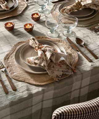 mcgee and co spring table laid with a green plaid tablecloth and floral napkins