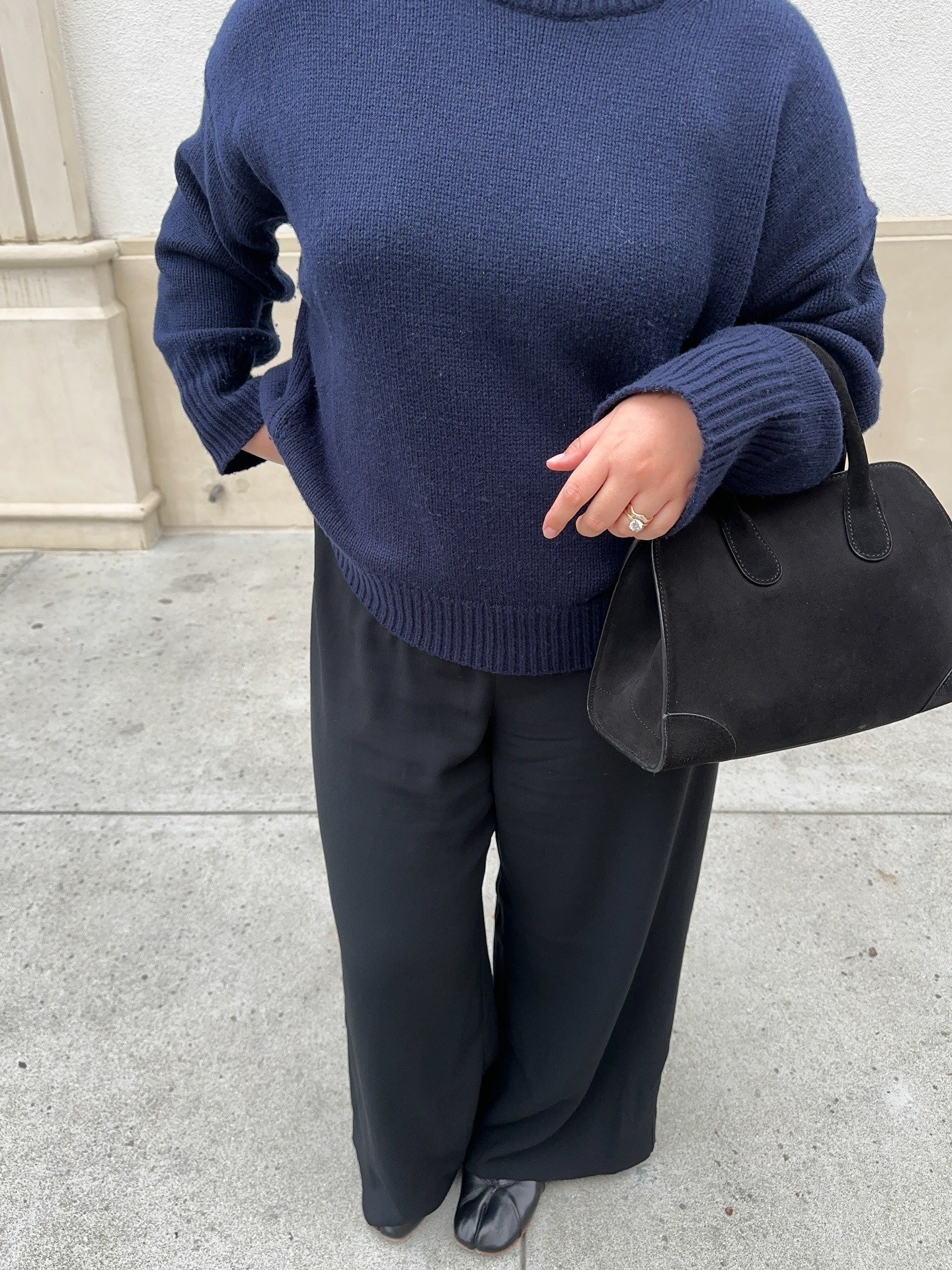 Marina Torres wearing the COS bowling bag