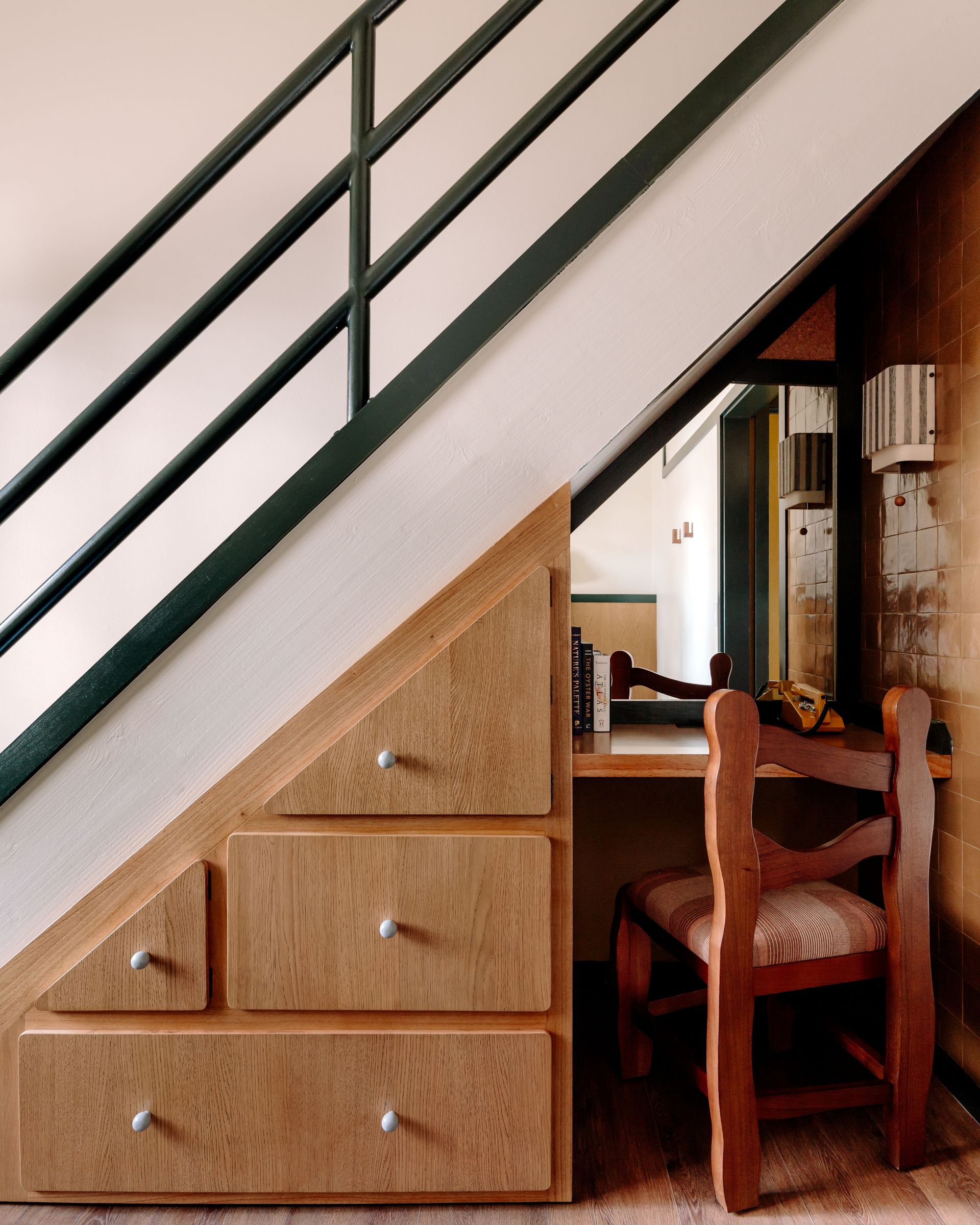 wooden draws beneath stairs