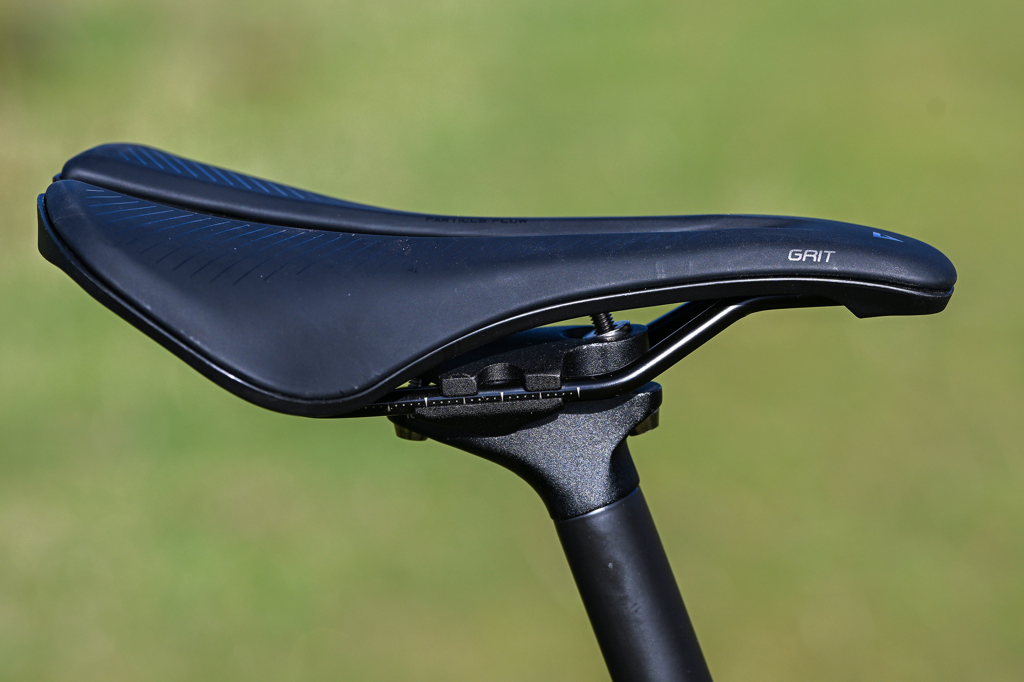 close up of the Grit saddle and black seatpost