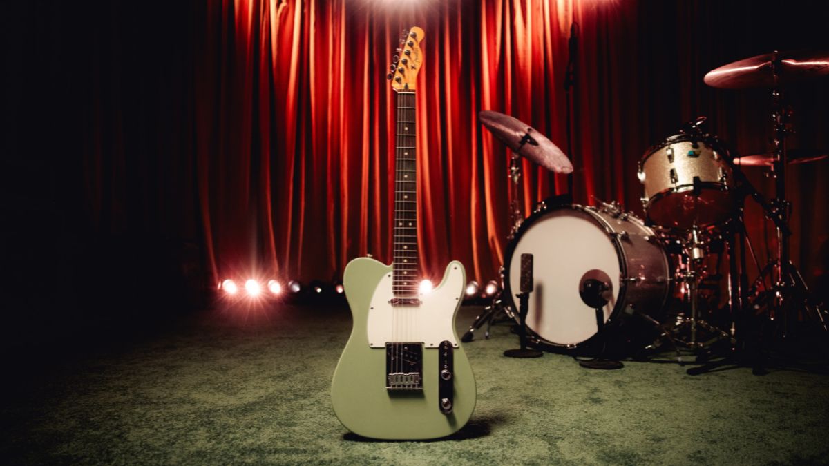 A Fender Player II Series Telecaster, positioned in front of a drum kit