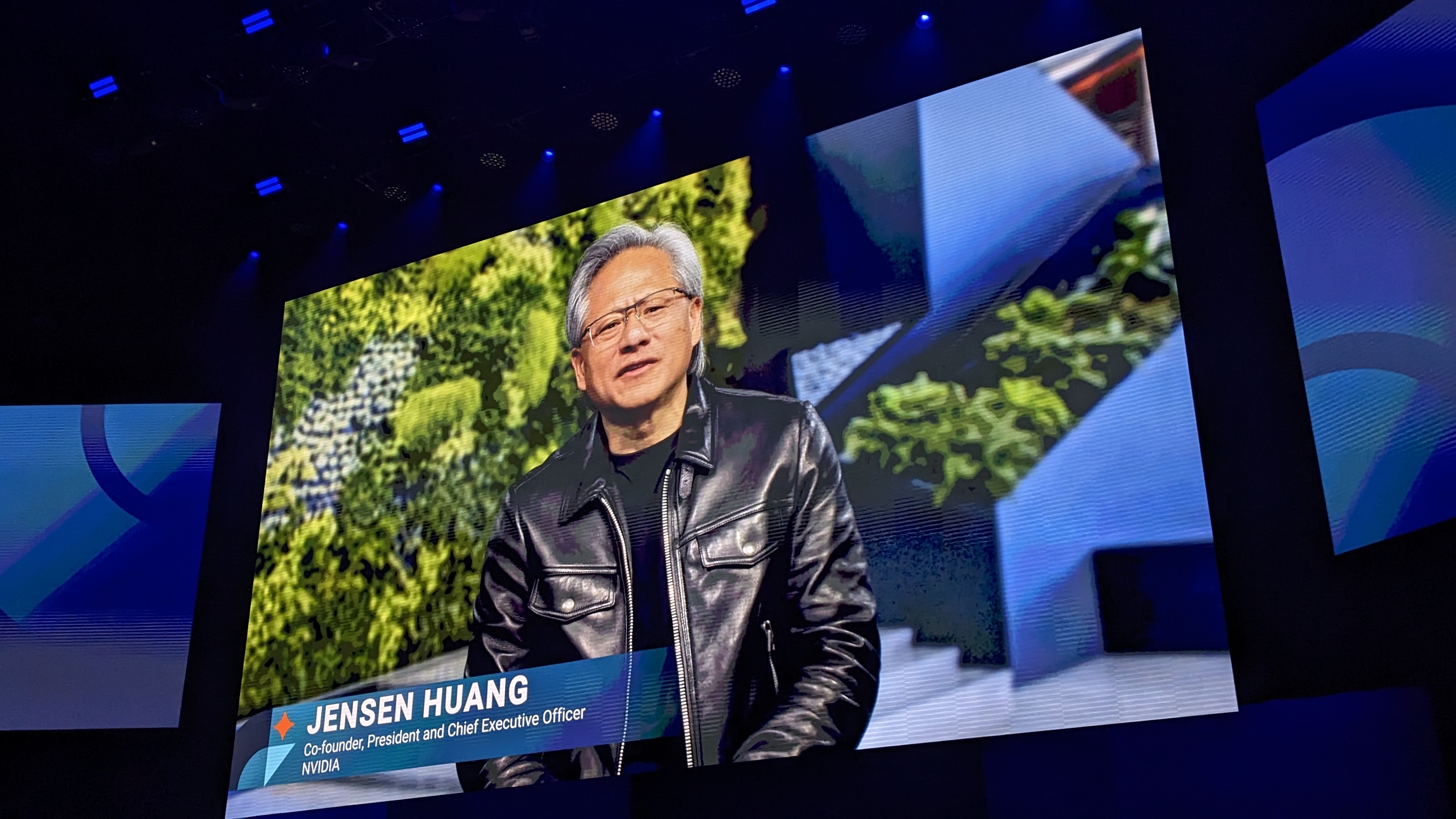 Nvidia CEO Jensen Huang on a large screen
