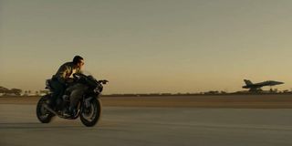 Tom Cruise on his motorcycle in Top Gun: Maverick