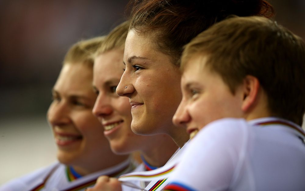 oe Dygert of America poses with her gold medal after winning the Women's Team Pursuit Final