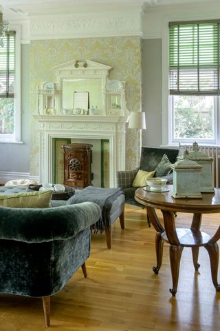 living room in Victorian home with original fireplace