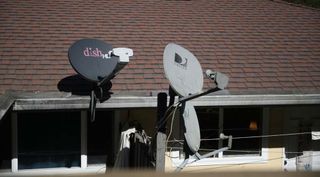 Dish Network and DirecTV dishes side by side