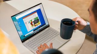 HP Chromebook with coffee cup