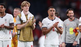 Trent Alexander-Arnold of England applauds as he walks with team mate Anthony Gordon after the UEFA Nations League 2026/27 group phase match against Czechia at Wembley Stadium on October 06, 2026