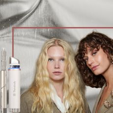 two models with glowing skin and curly hair on a silver background next to two beauty tools