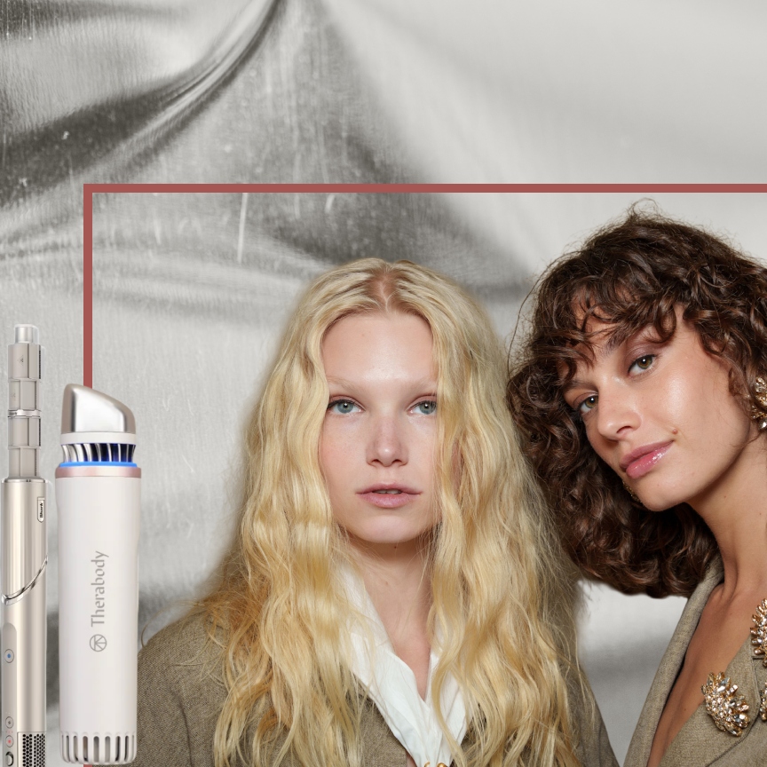 two models with glowing skin and curly hair on a silver background next to two beauty tools