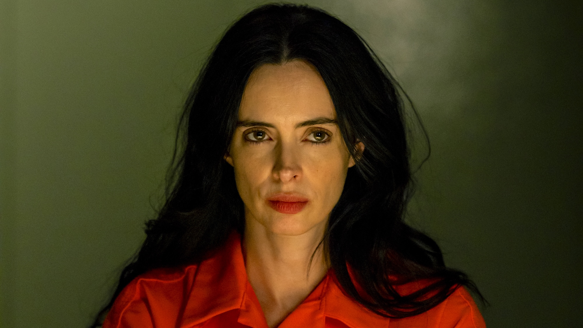 Mia wearing prison jumpsuit in interrogation room in Dexter: Resurrection Season 1