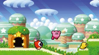 best Nintendo DS games: Kirby flying over a red enemy on a meadow
