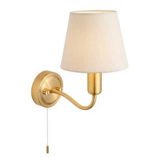 brass wall light with cream shade