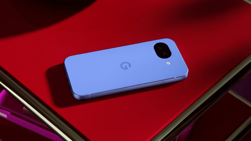 The Google Pixel 10a on a red surface.
