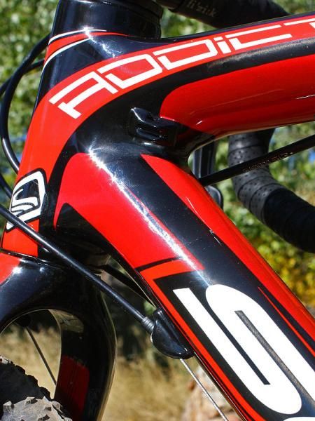 Just as on the road-going Addict, cable stops are molded carbon instead of aluminum