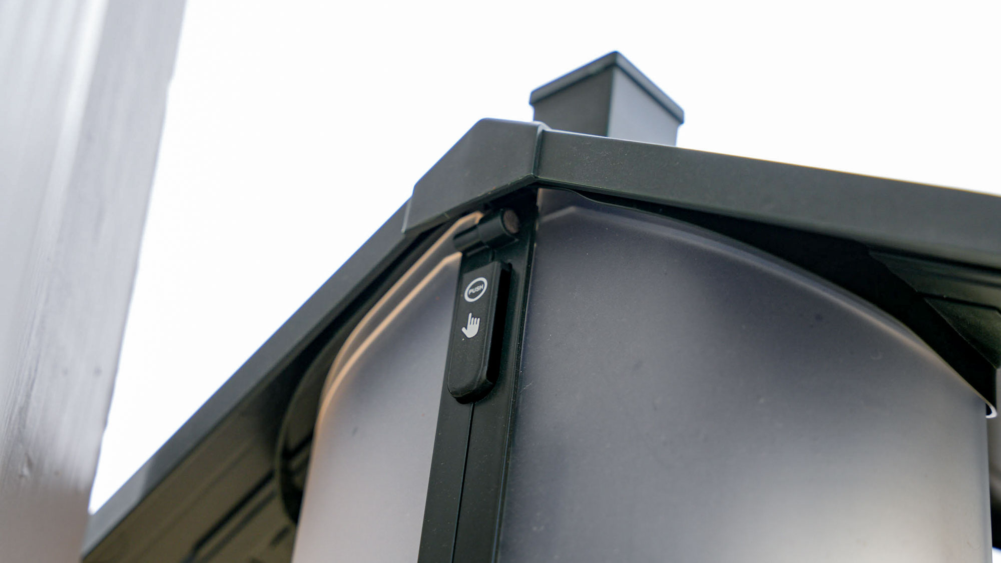 Close up of te release mechanism on the Feathersnap Scout Bird Feeder.