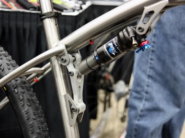 Black Sheep uses an aluminum link that stiffens up the rear triangle and also helps more closely control the rear shock rate.