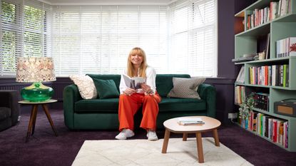 living room with Sara cox and bookcase with books