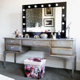 Dressing table with mirror and LED frame light around it