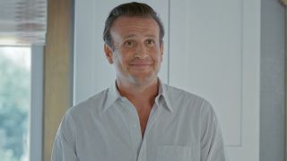 Jason Segel smiling as Jimmy in Shrinking. 