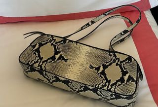 Khaite Simona Bag in snakeskin print.