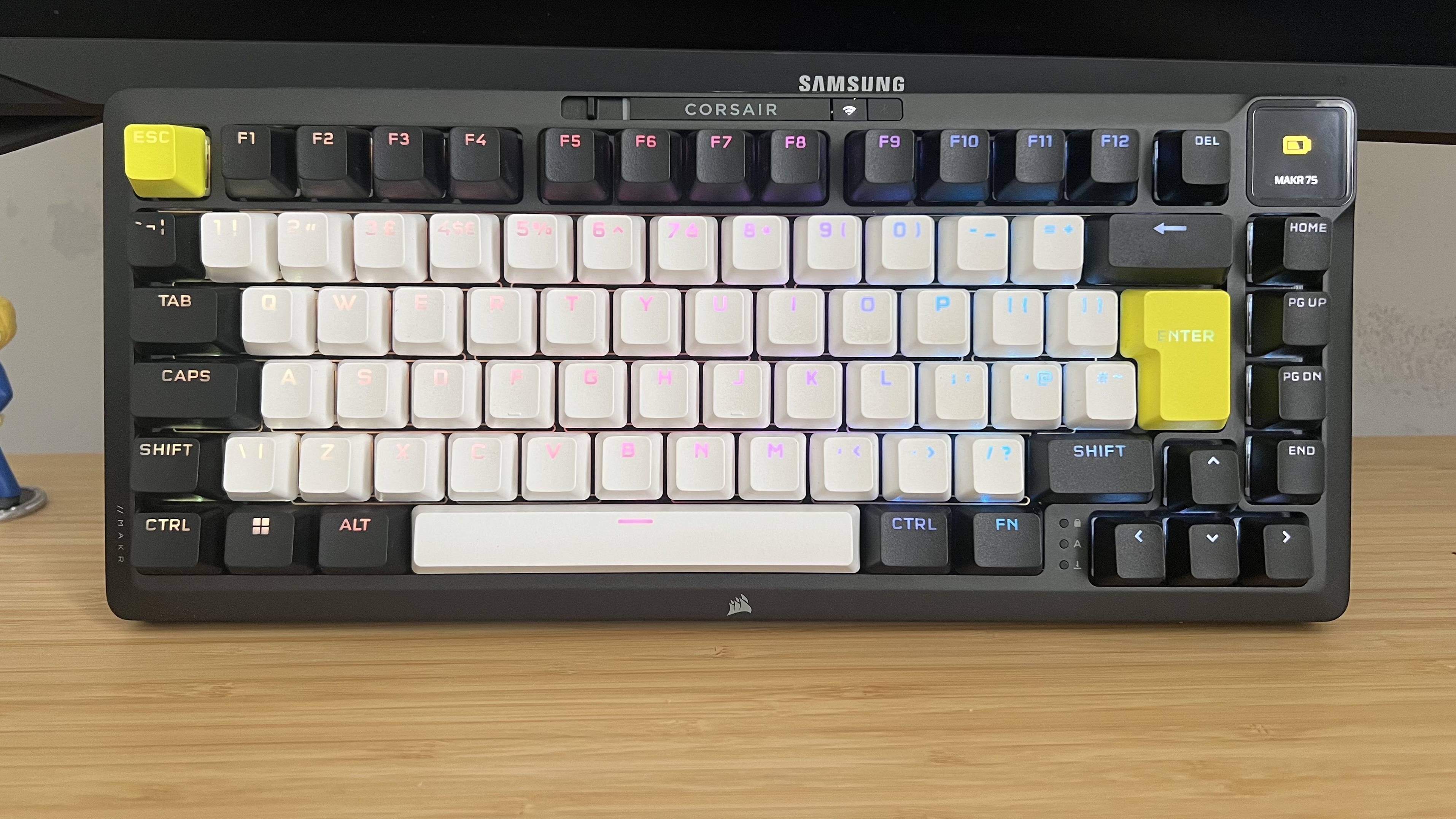 Corsair MAKR 75 gaming keyboard on a wooden desk
