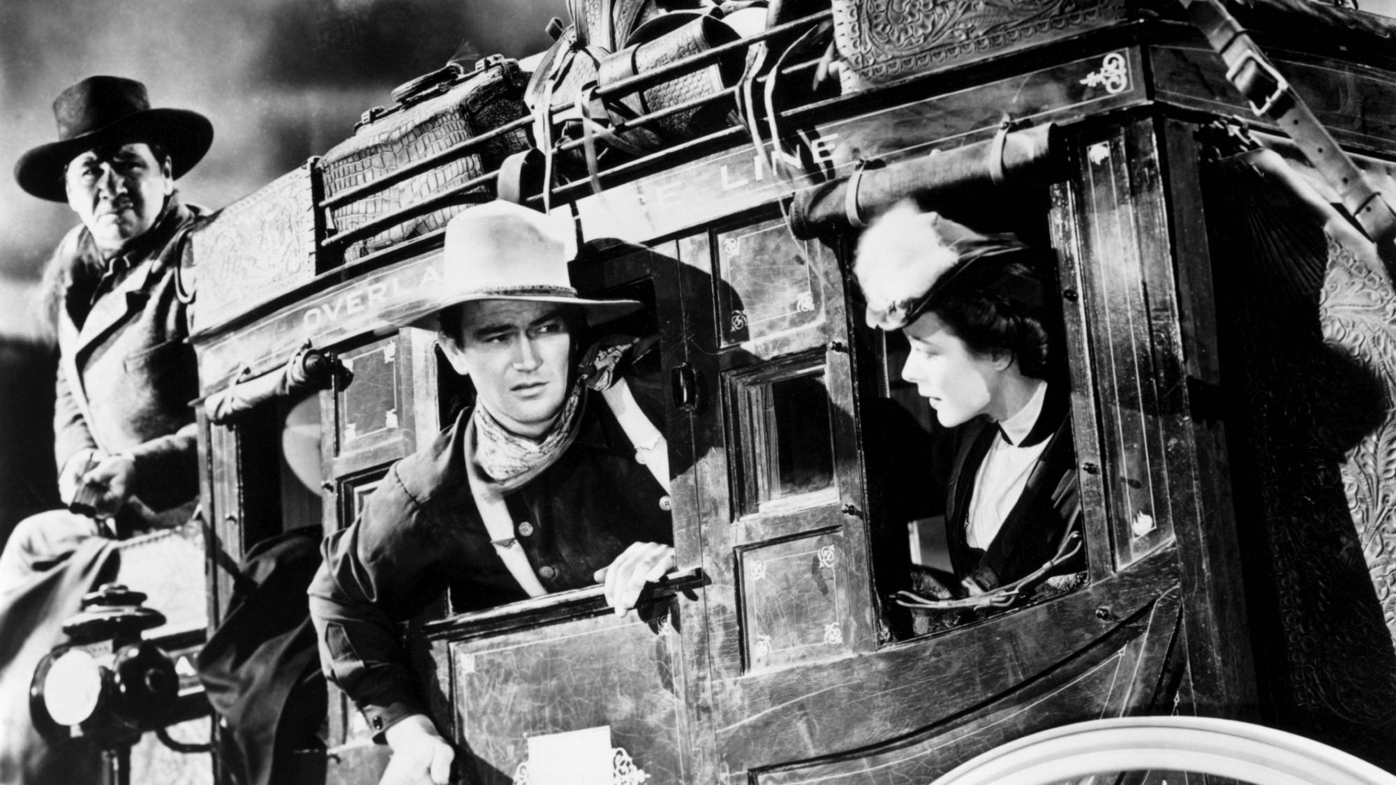 John Wayne and cast in Stagecoach (1939)