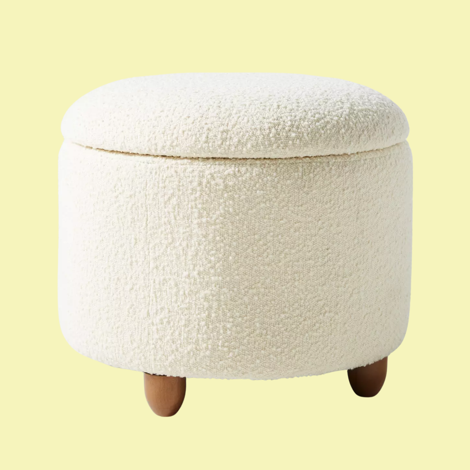 A white boucle storage seat
