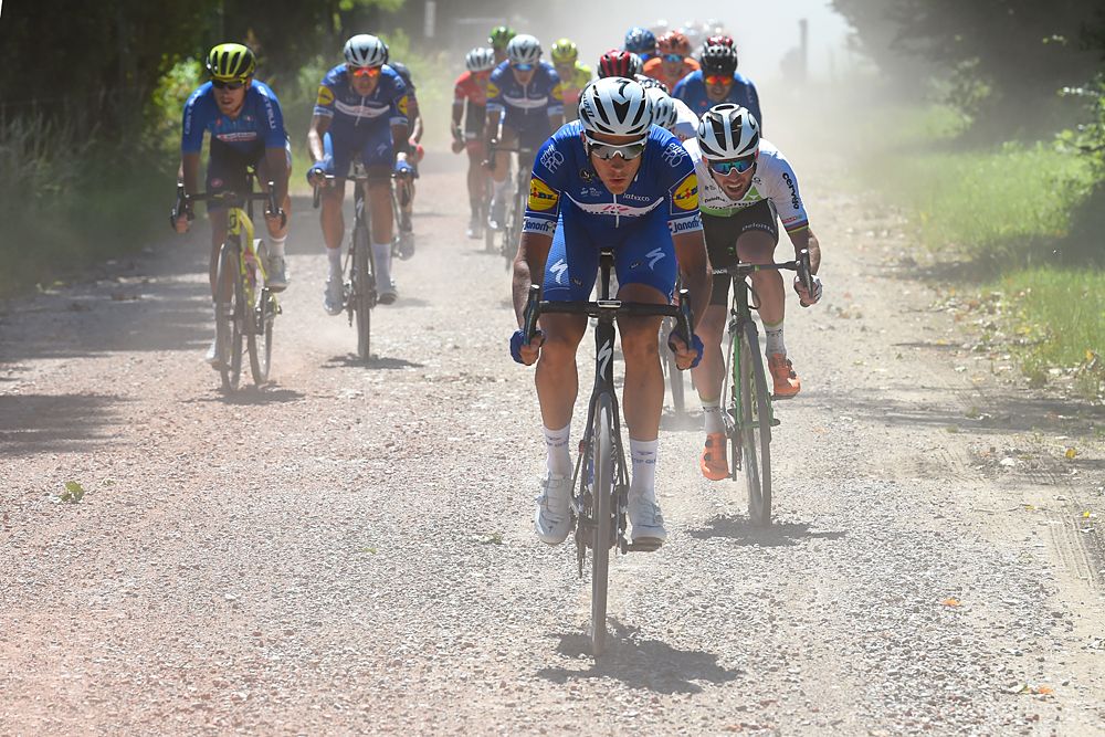 Niki Terpstra (Quick-Step Floors) leads the field over the last section of dirt road during stage 4