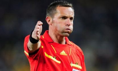 Referee Stephane Lannoy officiates during the World Cup match between Brazil and Ivory Coast.