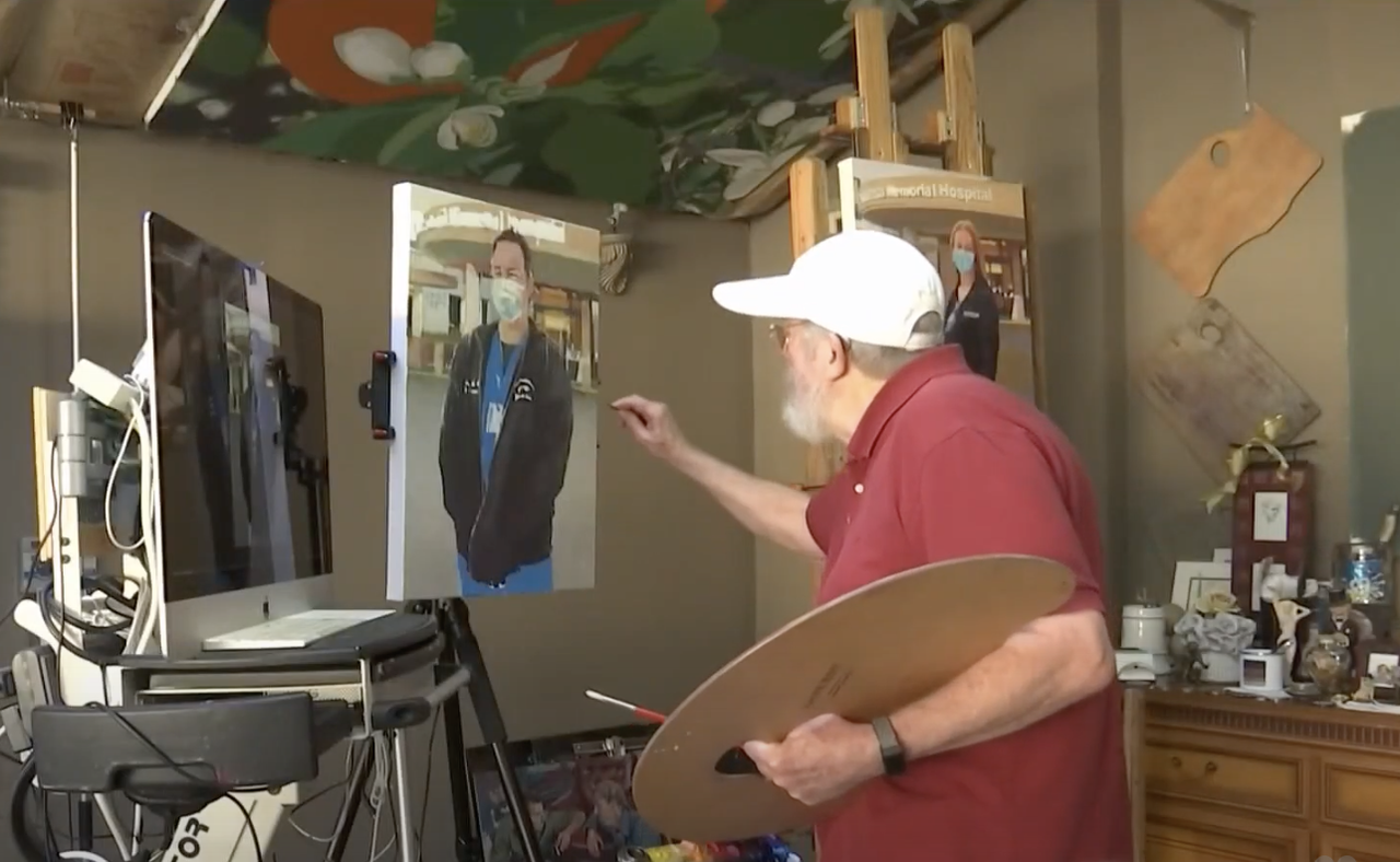 John Deckert working on a painting.