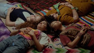 Valentina Herrera, Darby Camp, Alex Cooper Cohen, Emmy Liu-wang lie in a circle in The Slumber Party