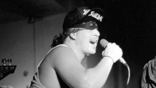 Suicidal Tendencies singer Mike Muir performing with the band in 1987